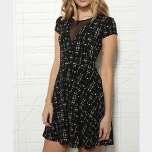 Patterned skater dress with mesh cutout